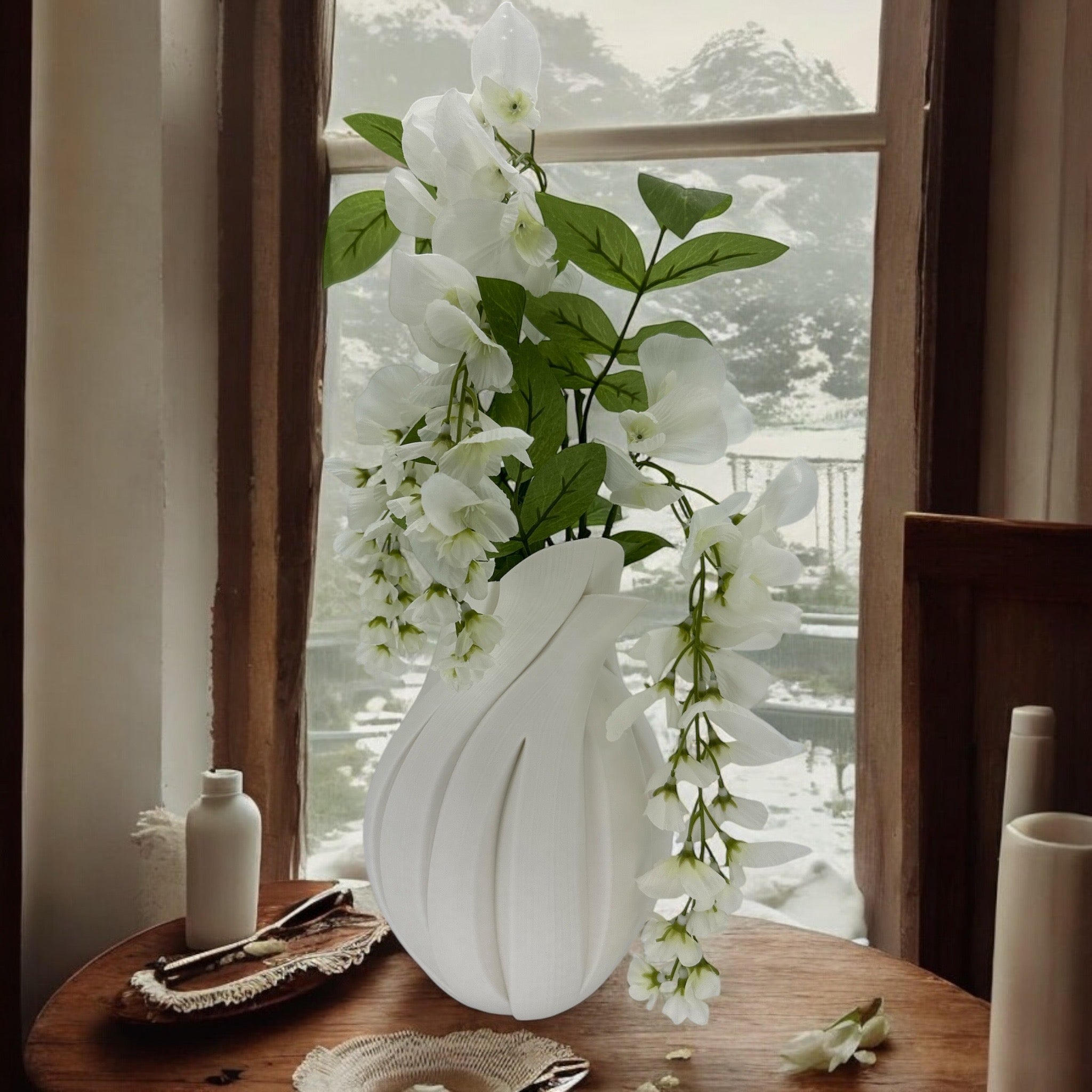 White Flame Vase styled with mixed florals – twisted sculptural decor
