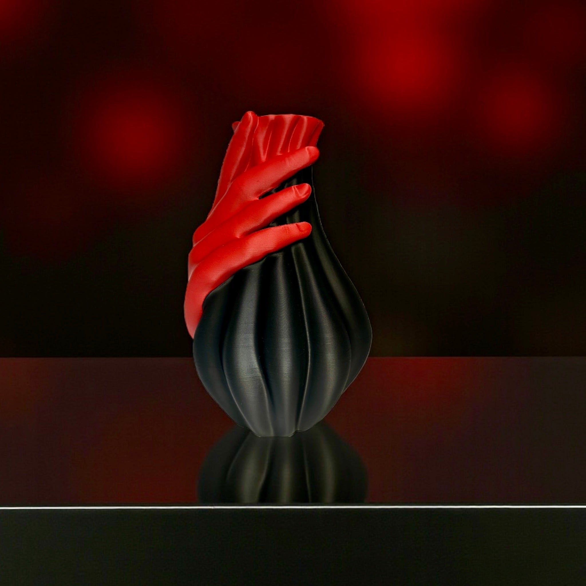 Black and dark red Hand Vase – two-tone sculptural centerpiece