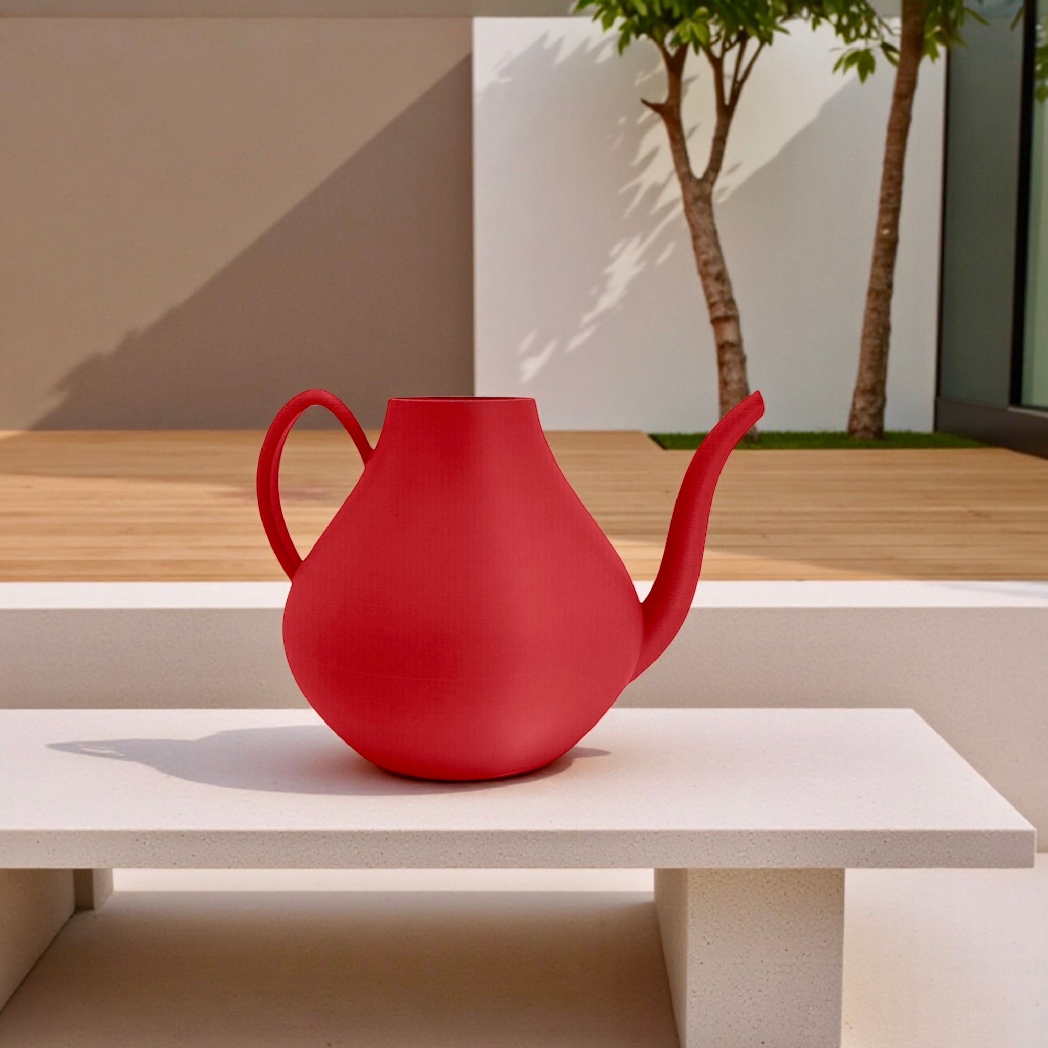 Orange Modern Watering Can with houseplants – modern sculptural indoor watering can