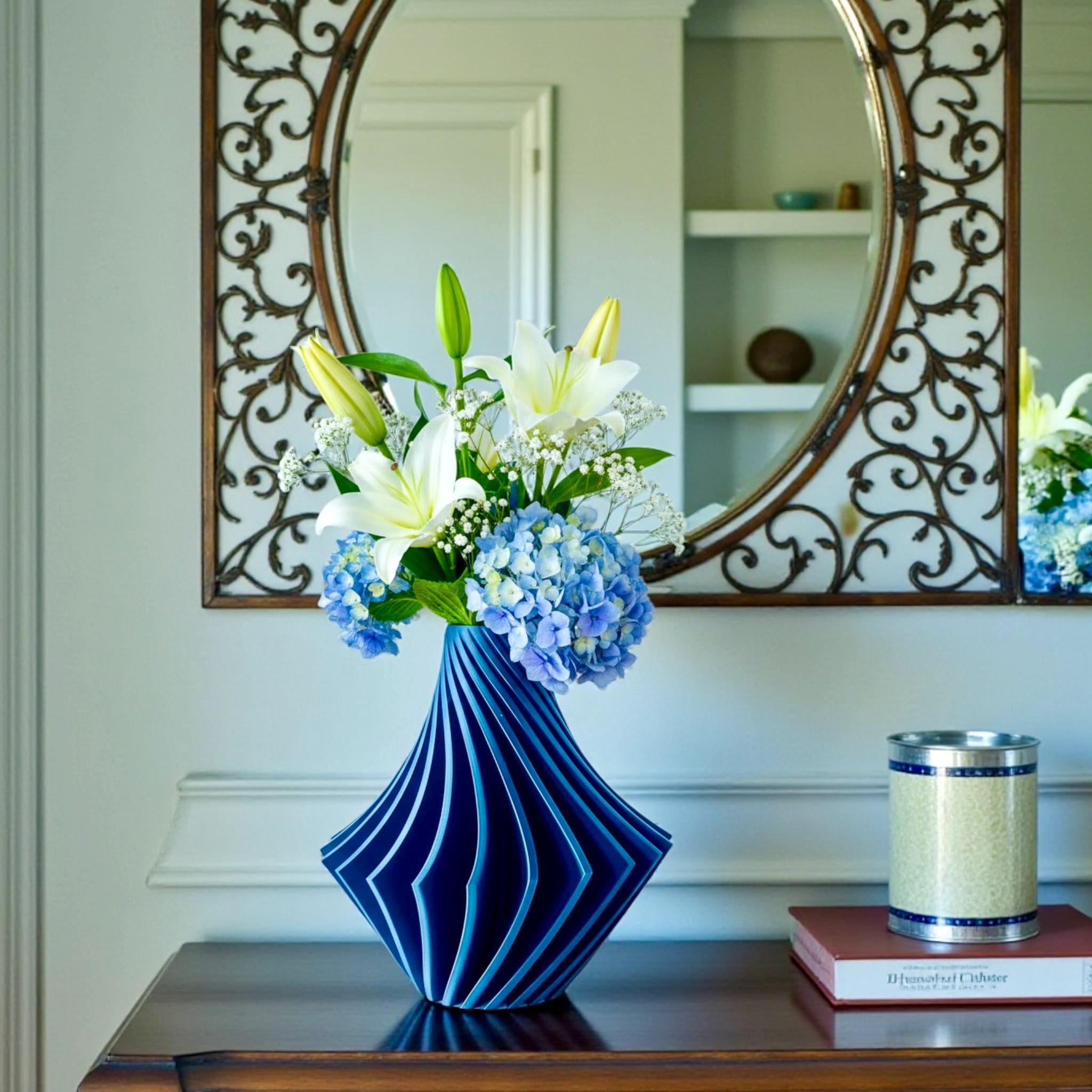 Navy Spiral Vase styled with tall flowers – geometric spiral sculptural vase