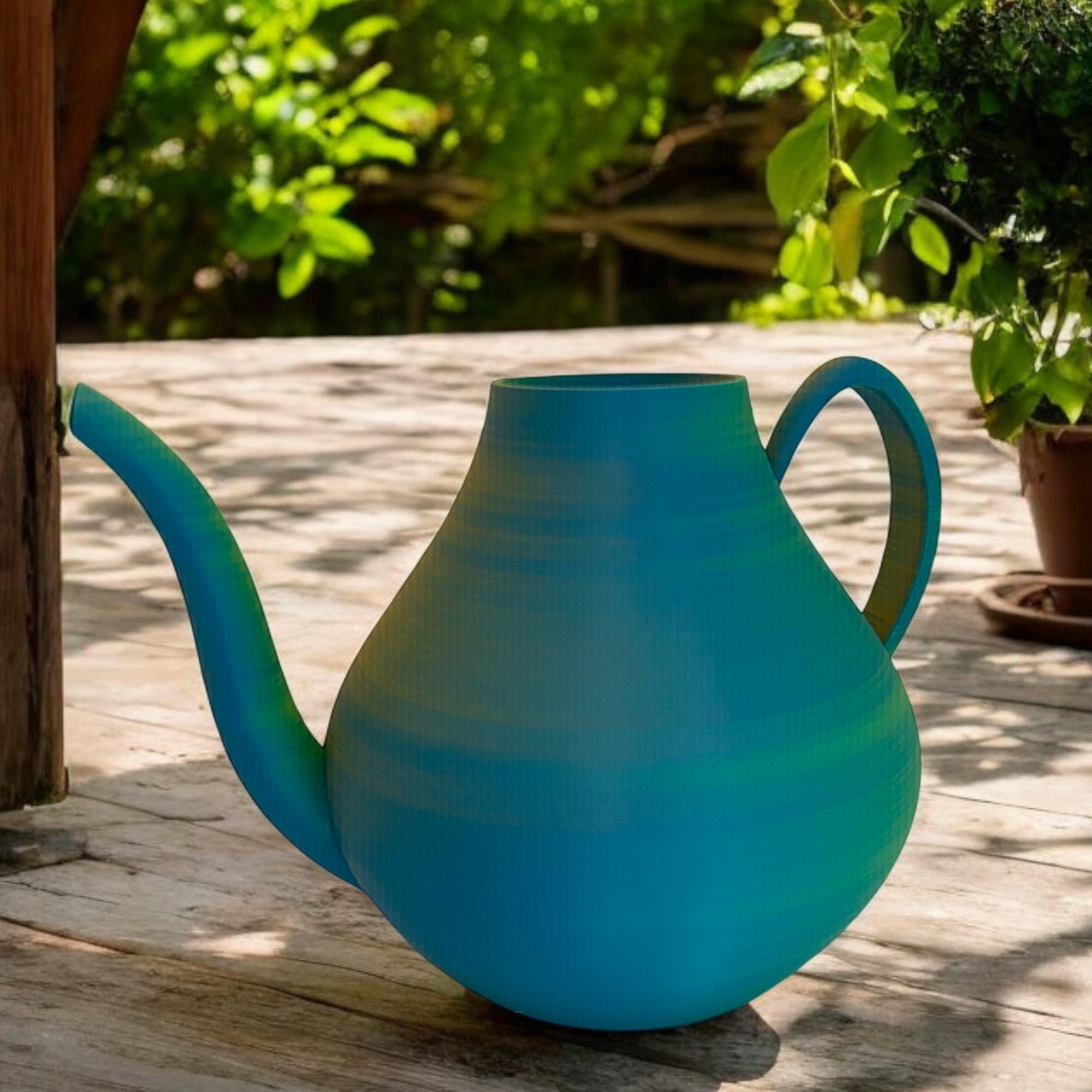 Sunbeam Watering Can outdoors in greenery – Hues Fusion sculptural watering can