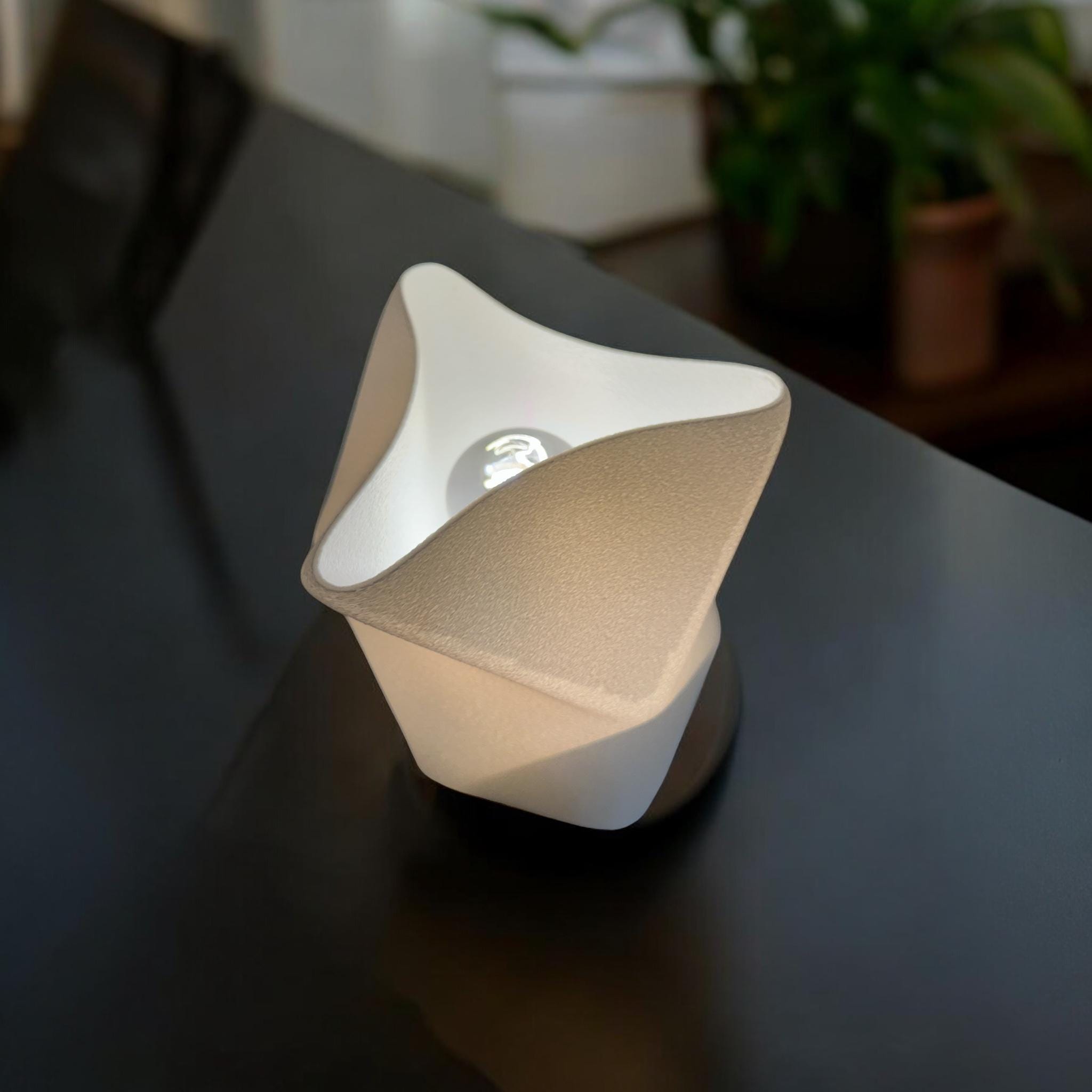 Origami table lamp shown from a close angle by Pashmation