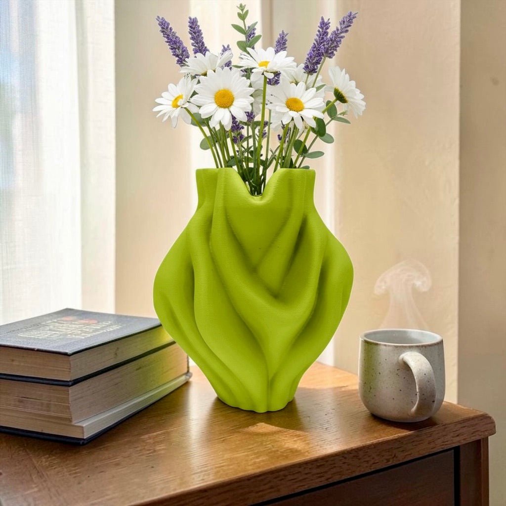 Green Ripple Bubblegum Vase styled with branches – bulbous sculptural decor