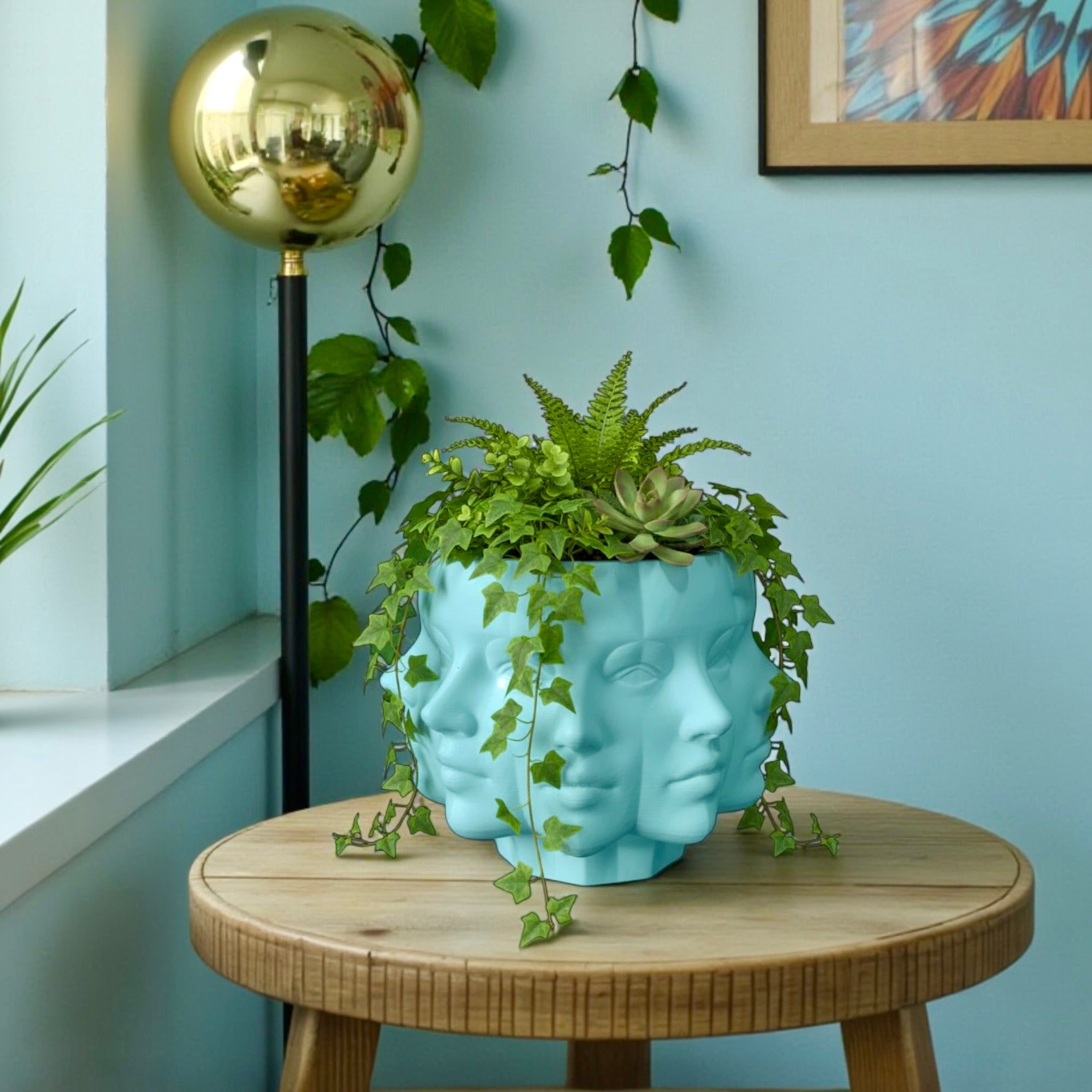 Blue Multi-Face Planter styled in living room interior with plant