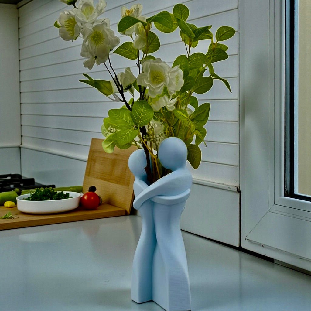Embrace Vase styled with dried botanicals – figural love symbol decor