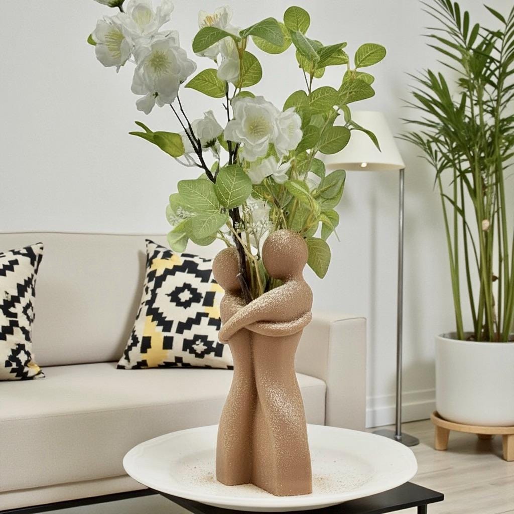 Tan Embrace Vase styled with dried botanicals – figural love symbol decor