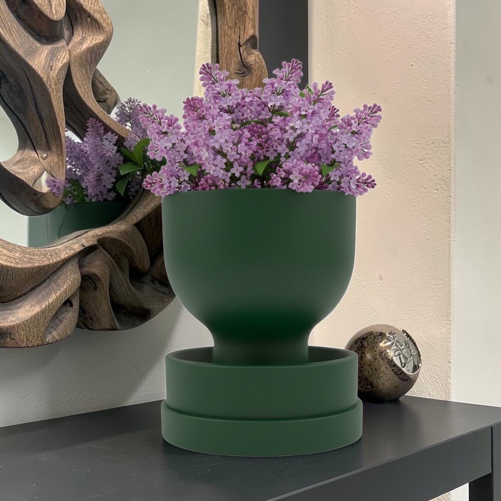 Green self-watering planter with modern reservoir design by Pashmation