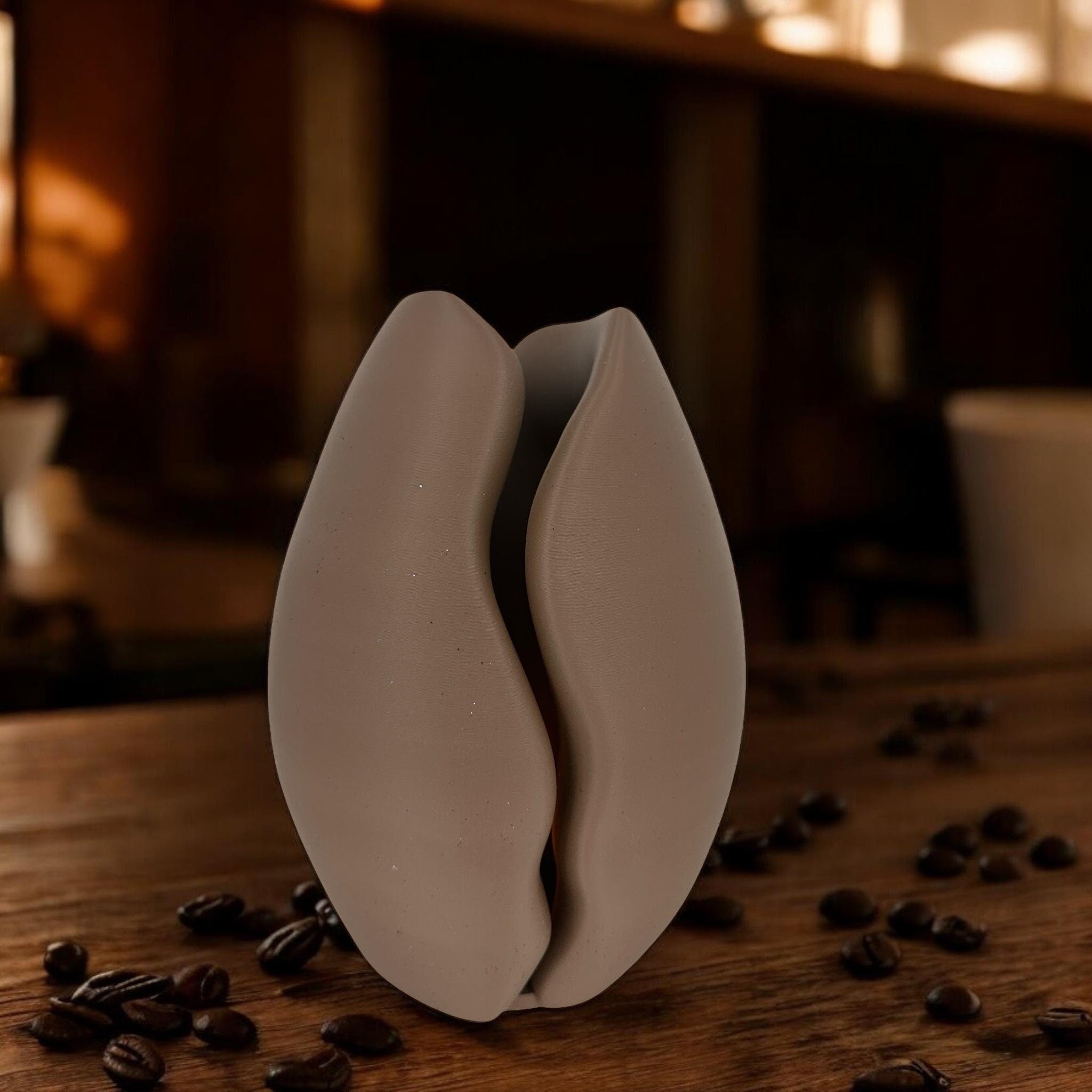 Brown Coffee Bean Vase styled with daisies in coffee shop interior