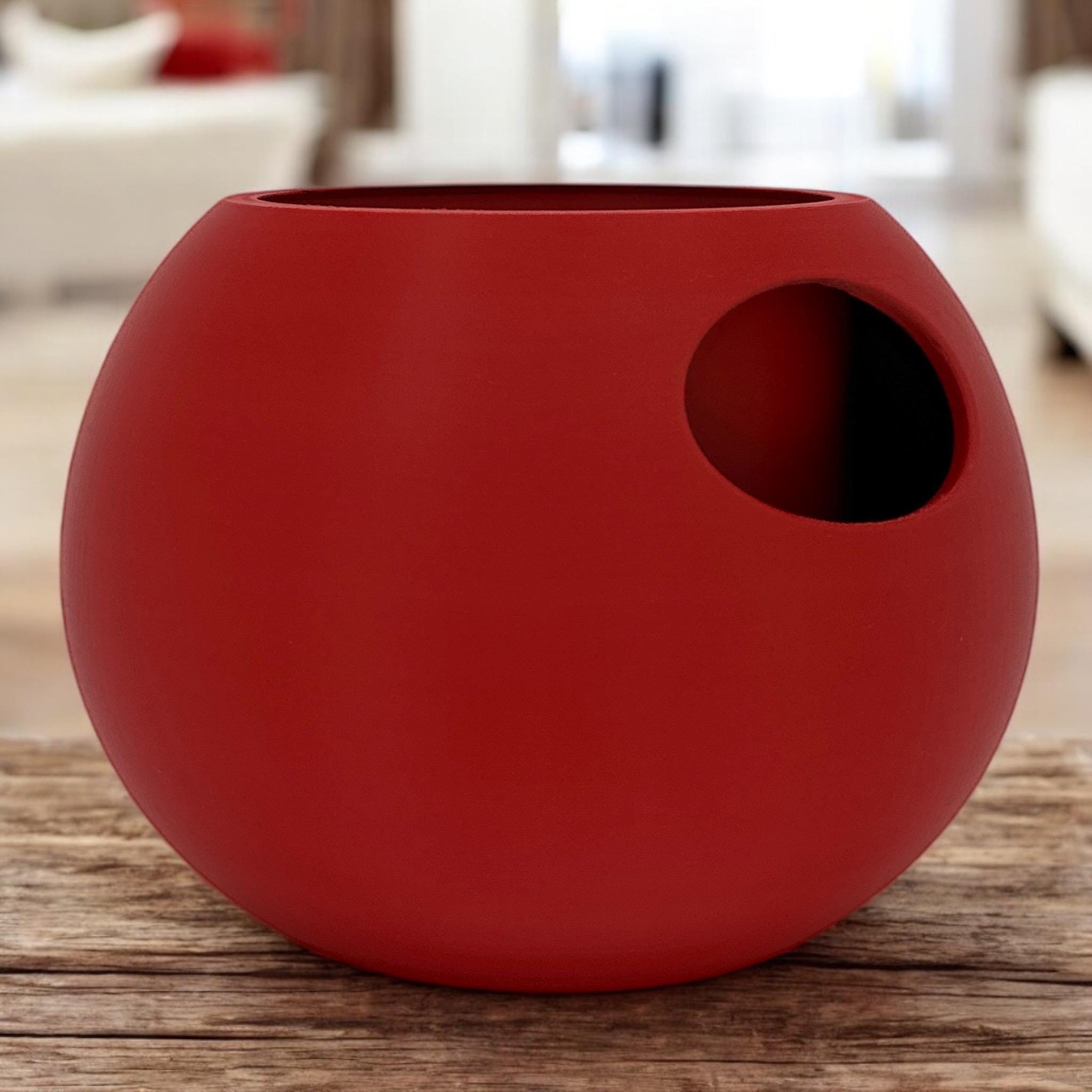 Dark Red Self-Watering Sphere Planter on wood surface – modern sphere-form pot with side opening
