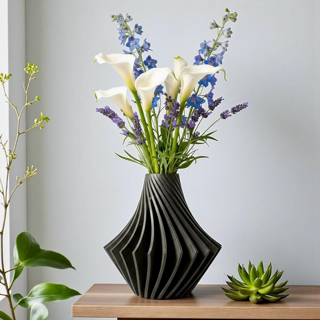 Black Spiral Vase with white and blue flowers – twisted geometric sculptural centerpiece