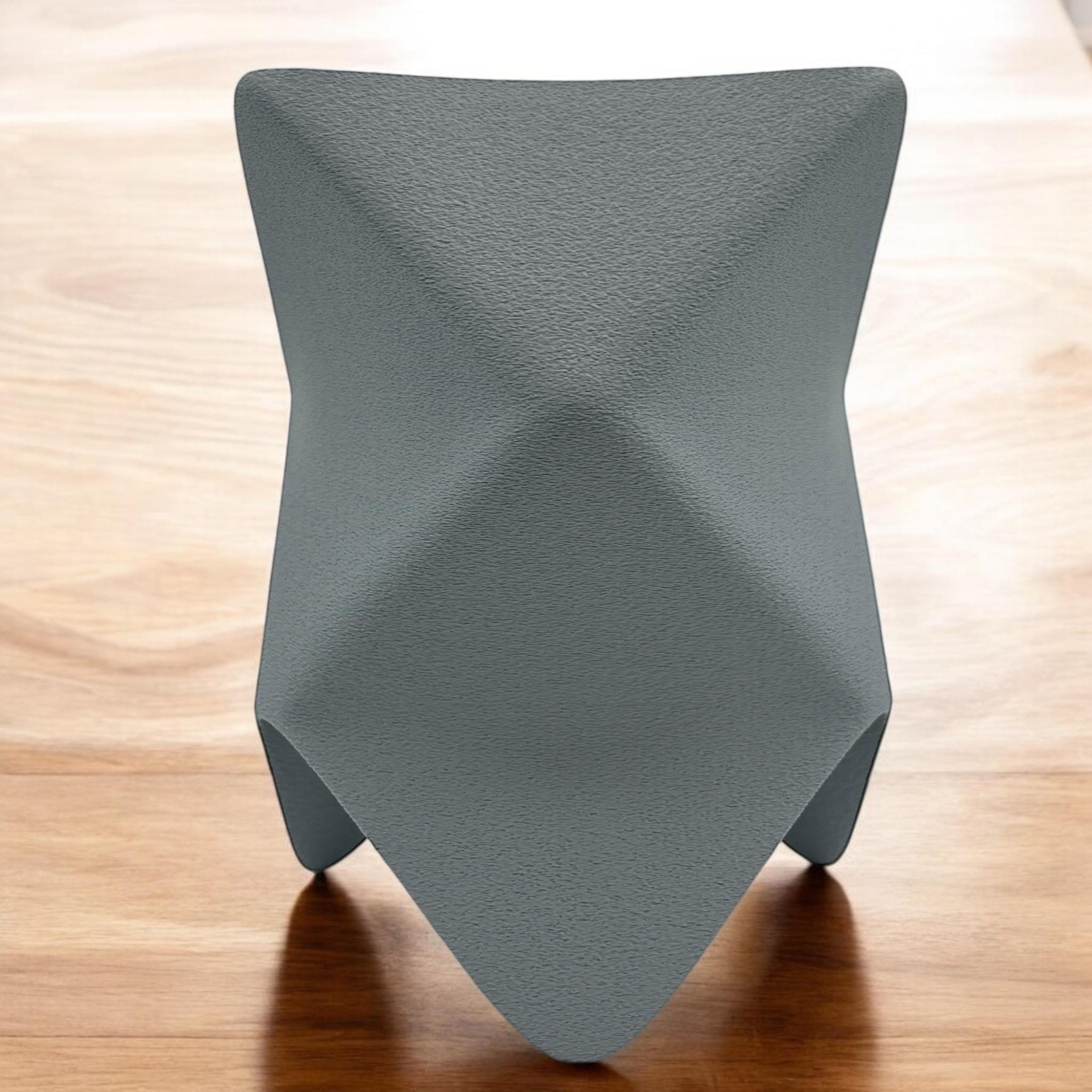 White geometric origami table lamp on a warm neutral background by Pashmation