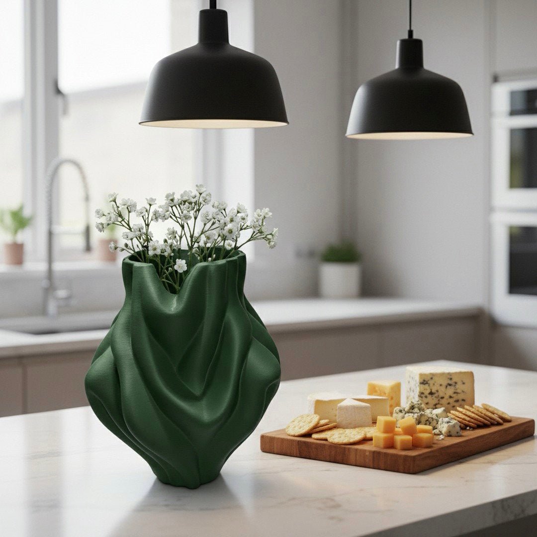 Green Ripple Bubblegum Vase styled with branches – bulbous sculptural decor
