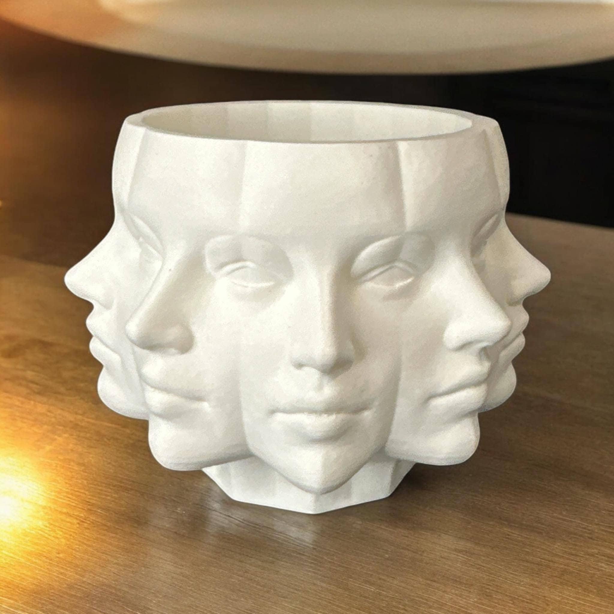 White Multi-Face Planter on shelf – figural decor with drainage