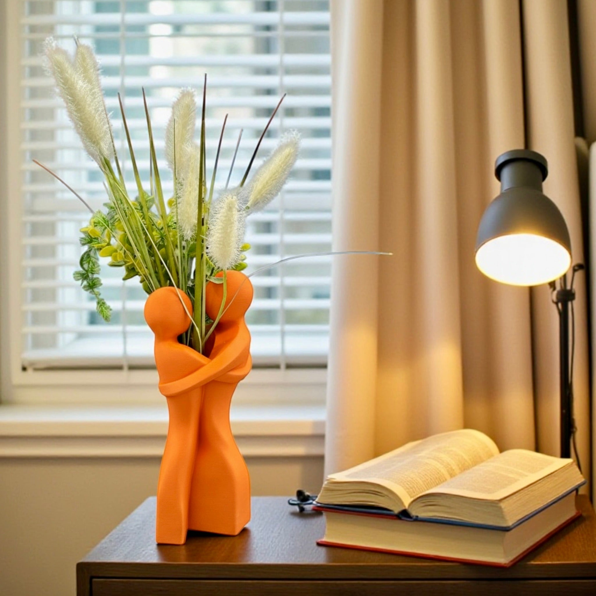 Embrace Vase styled with dried botanicals – figural love symbol decor