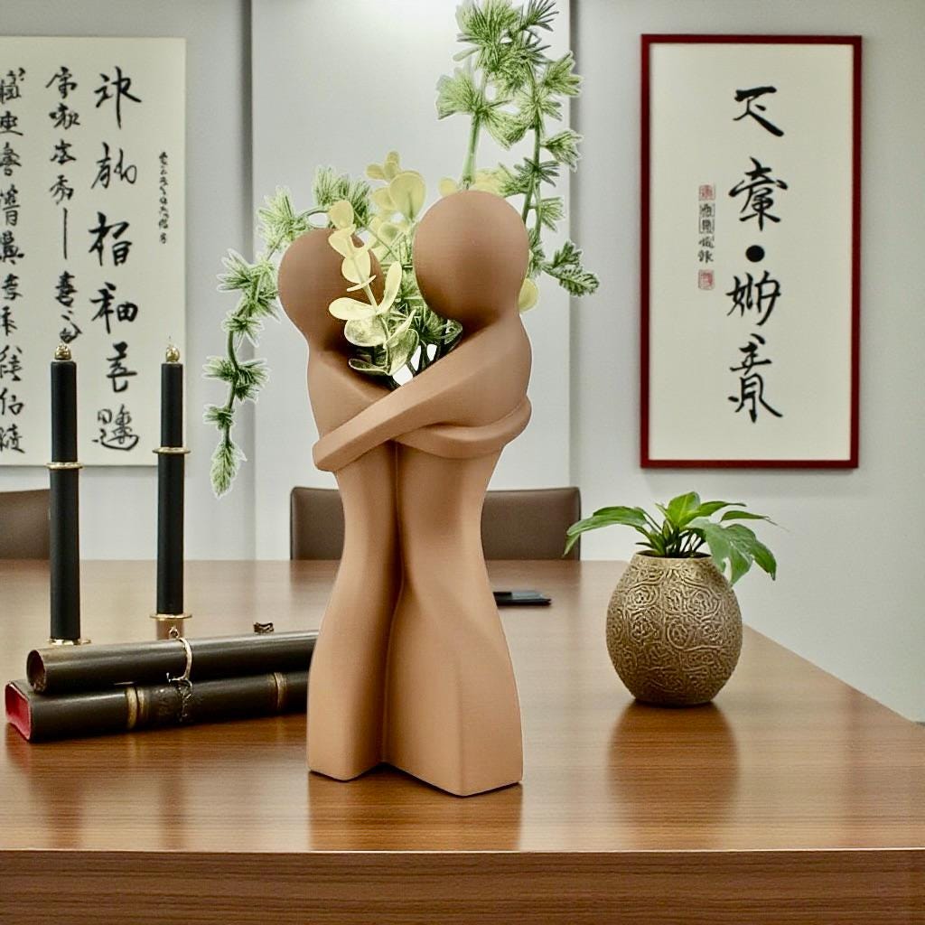Latte Embrace Vase styled with dried botanicals – figural love symbol decor