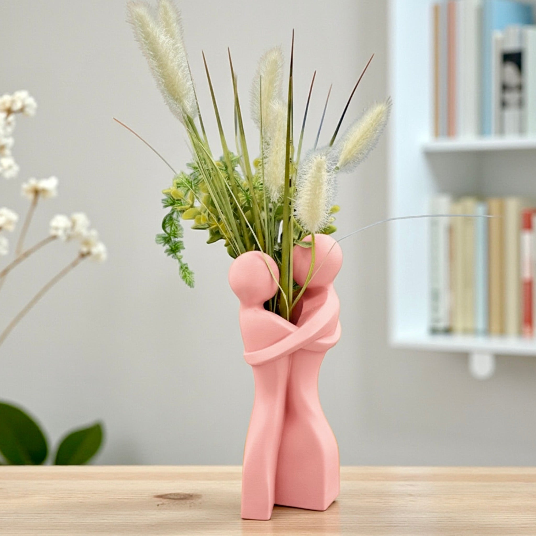 Pink Embrace Vase styled with dried botanicals – figural love symbol decor
