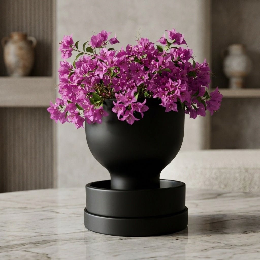 Self-watering planter styled with purple flowers by Pashmation