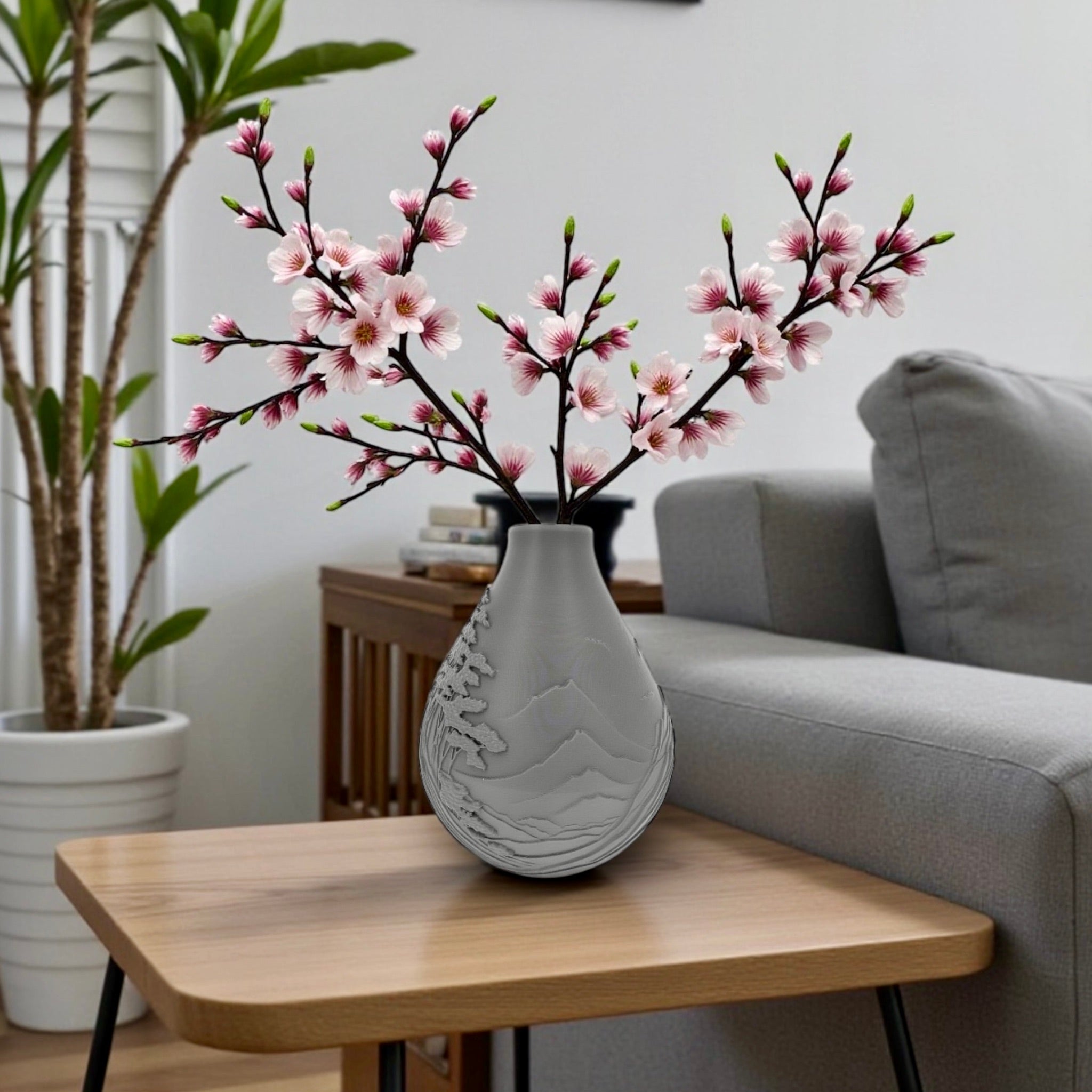 Grey mountain vase with dried flowers by Pashmation