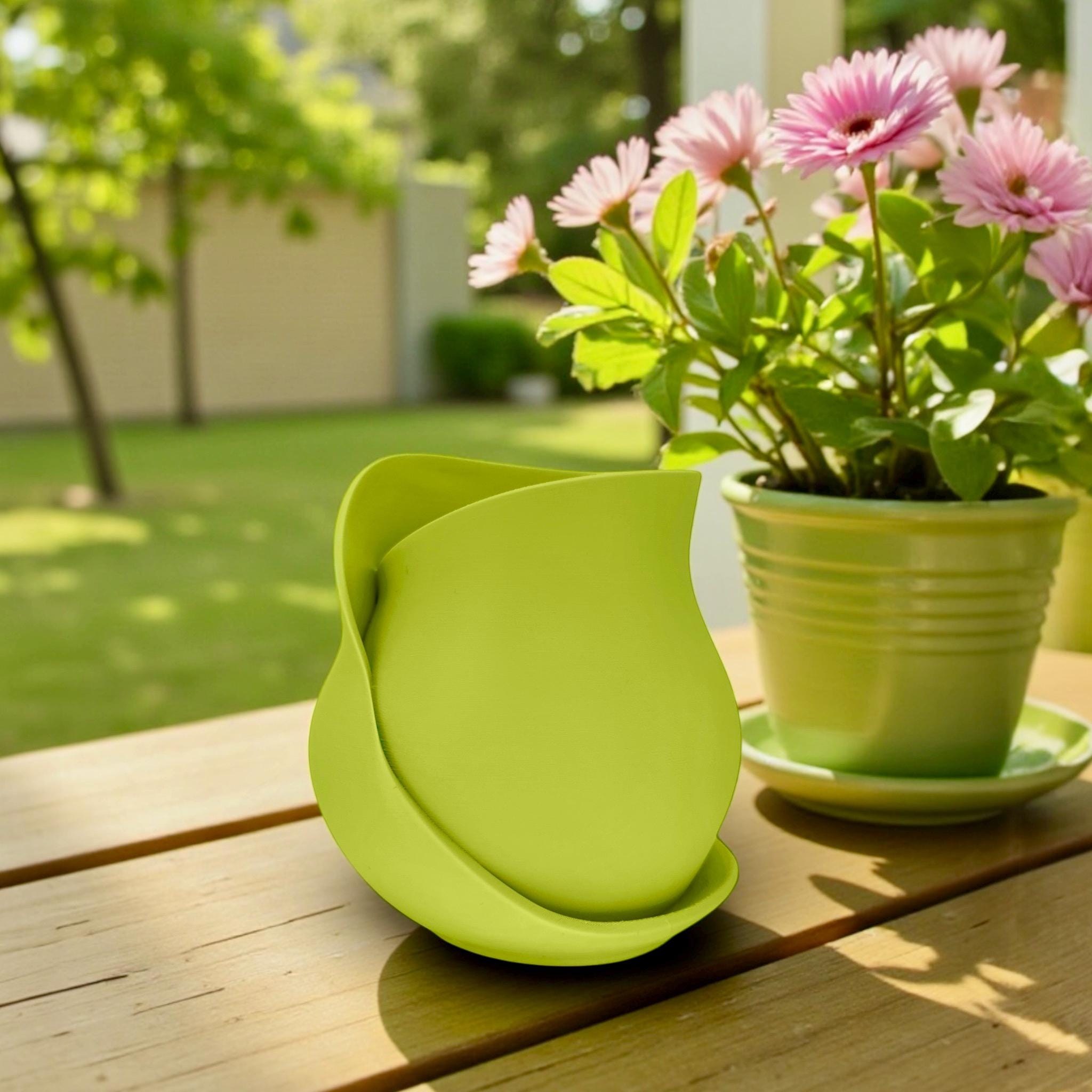 Lime green Curved Wrap Vase styled with greenery – asymmetric sculptural vase