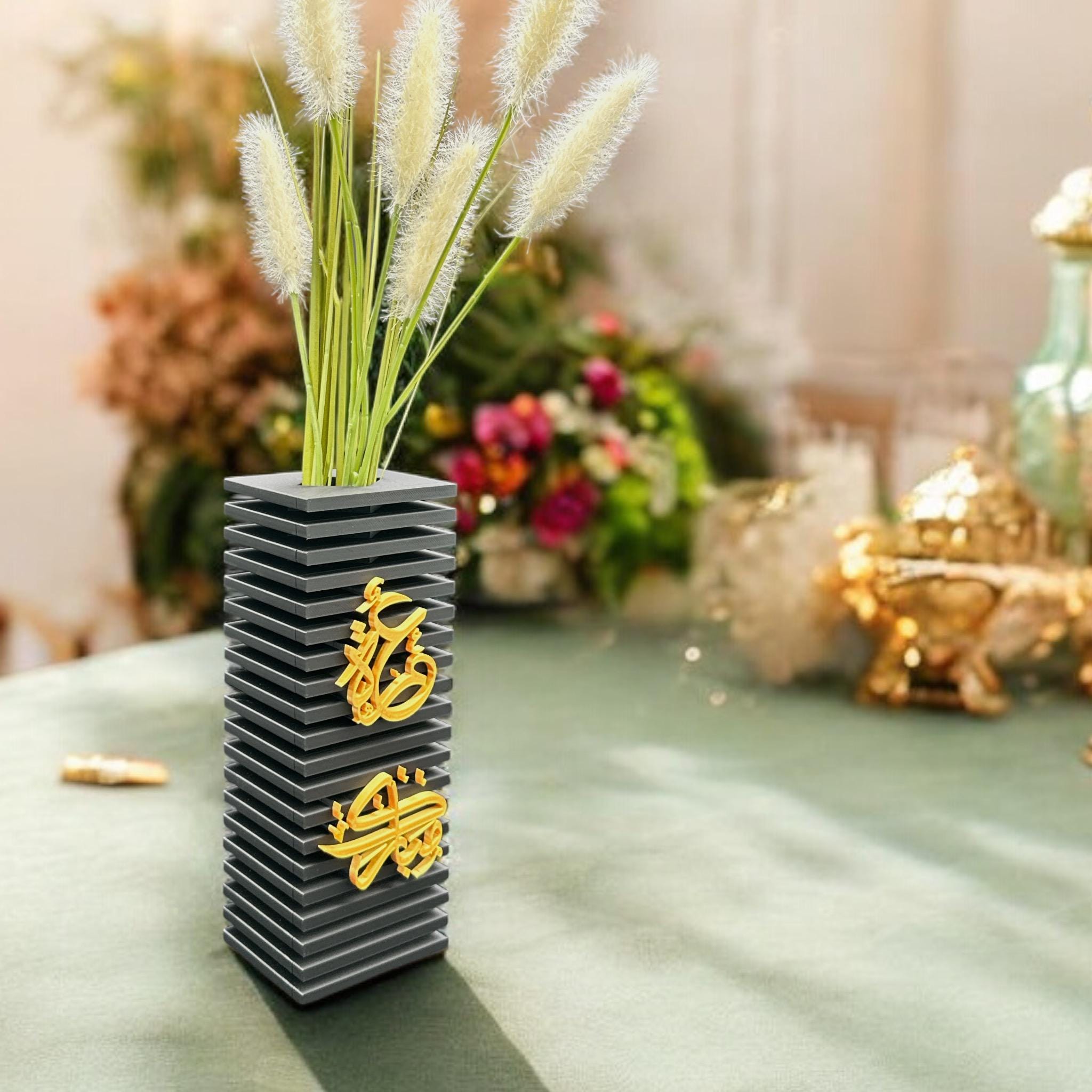 Black Umrah Mubarak Vase styled with botanicals – Islamic sculptural column